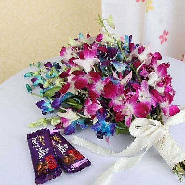 Orchid Bouquet with Dairy Milk Chocolates