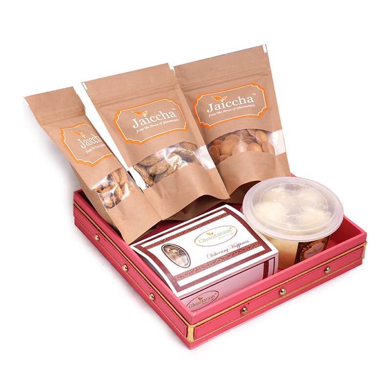 Pink Leather Holi Gift Basket of Gujiyas, Rasgulla, Butter Chakli, Methi Mathi and Coin Biscuits