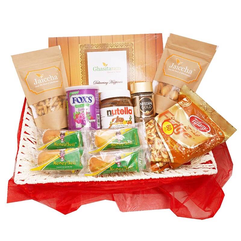Red Net Holi Gift Basket of 18 Goodies with Gujiyas