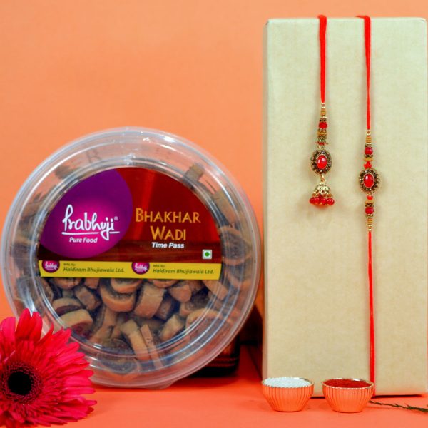 Charming Pair Rakhi with a Bhakhar Wadi Namkeen