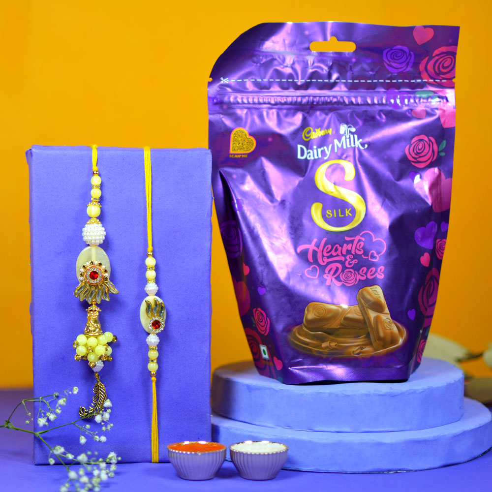 Designer Couple Rakhi N Dairy Milk Silk Home Treats