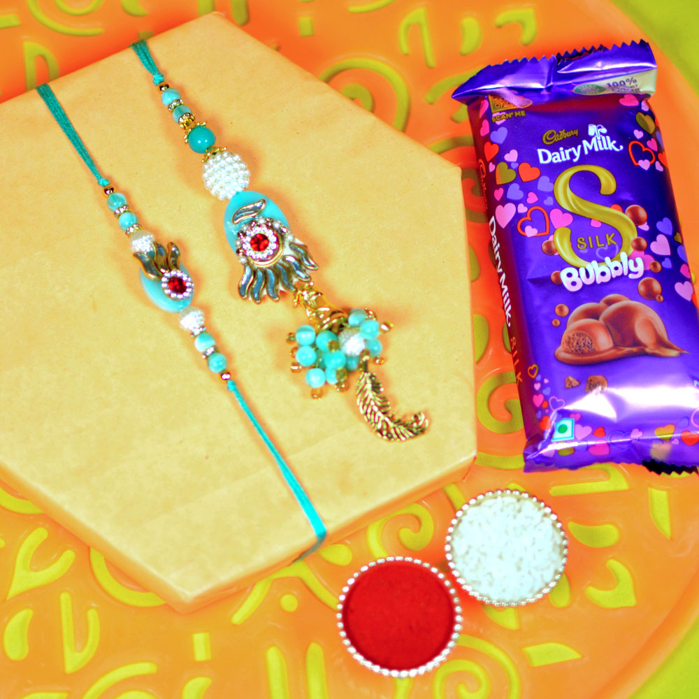 Majestic Bhaiya Bhabhi Rakhis with Dairy Milk Silk Bubbly Chocolate Bar