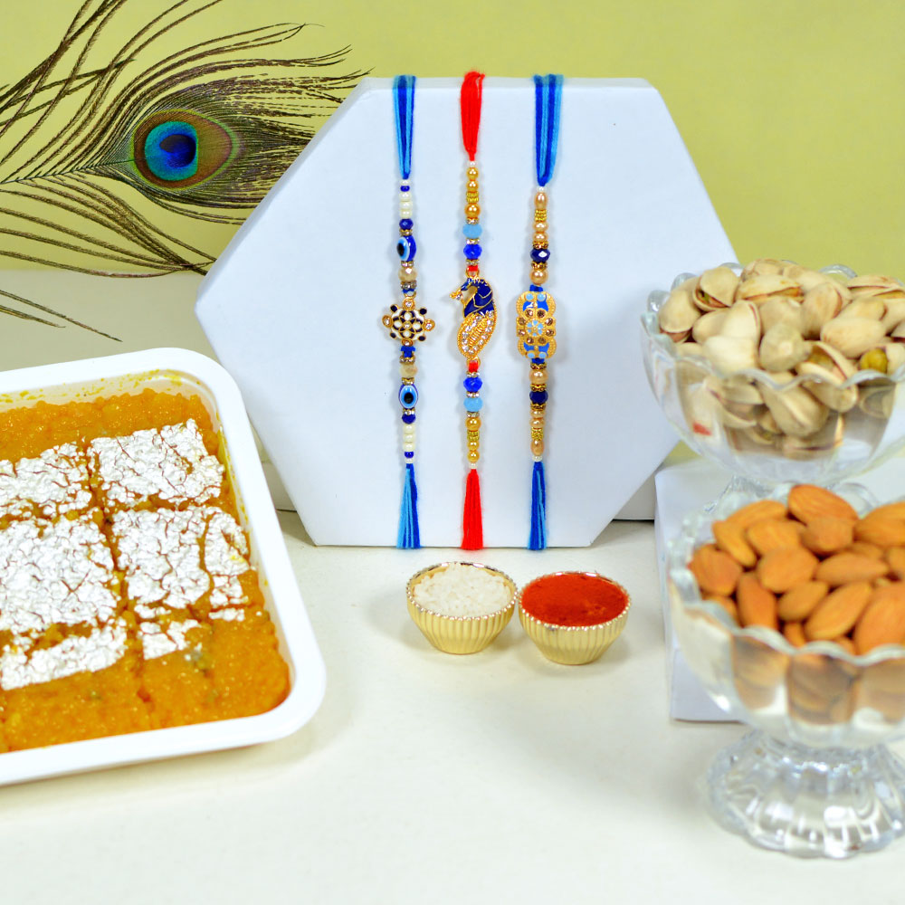 Bright Colourful Rakhi Trio with Sweets and Nuts