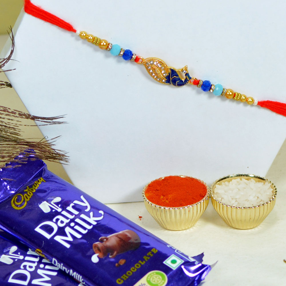 Metal Peacock Rakhi with Cadbury Dairy Milk Chocolate