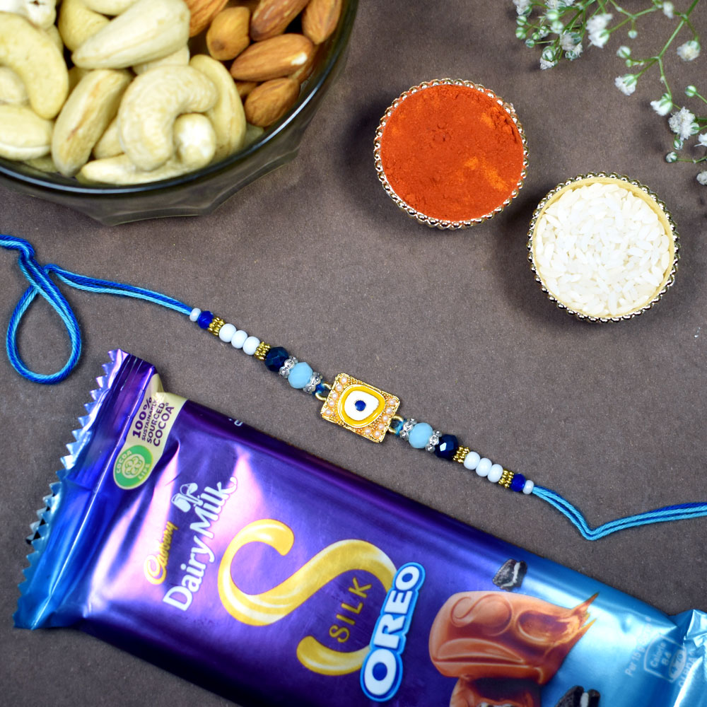 Golden Blue Evil-Eye Rakhi with Chocolate N Nuts